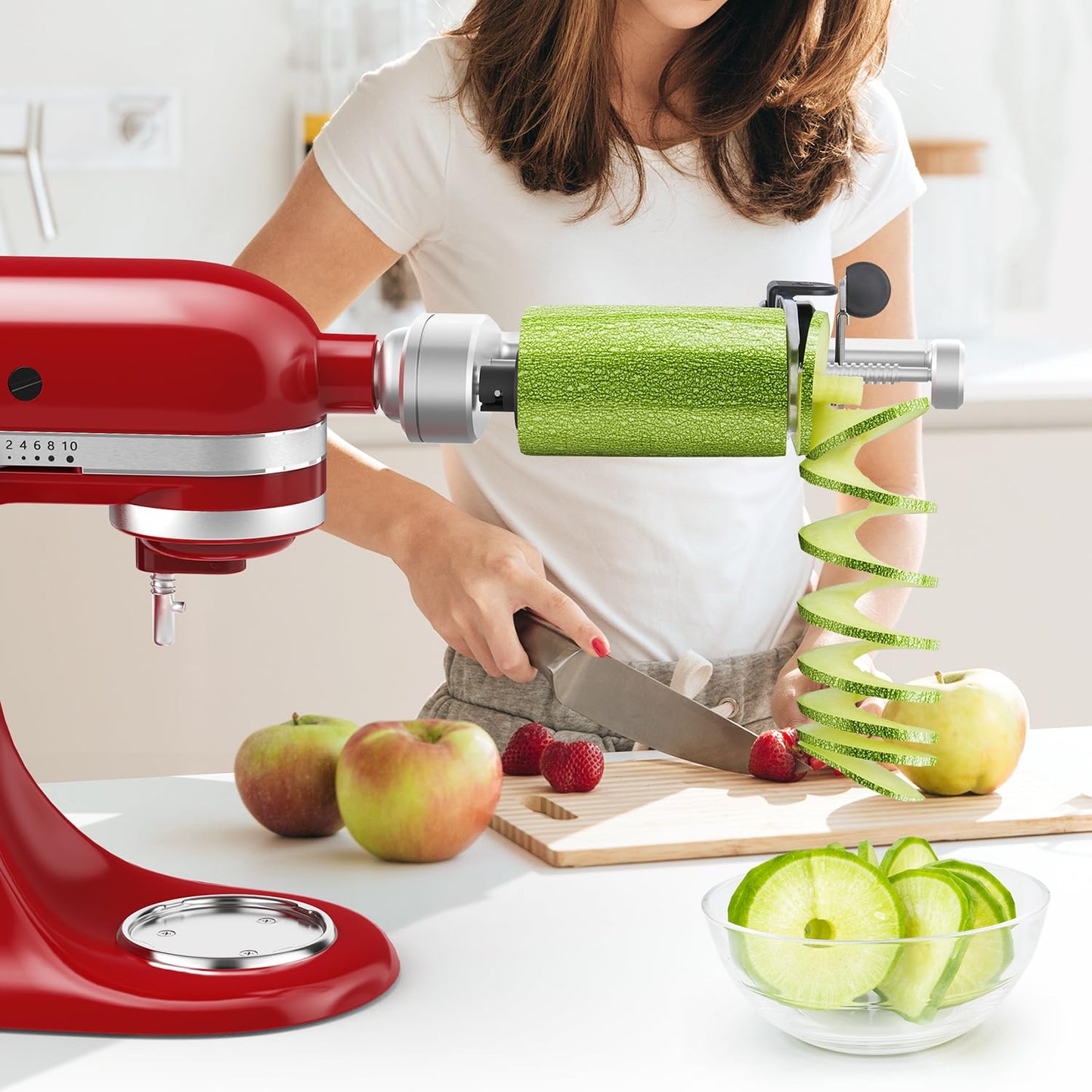 Compatible with KitchenAid stand mixers, this spiralizer attachment comes with 5 blades, peeler, and slicing disk. It's a vegetable slicer, not the brand's spiralizer.