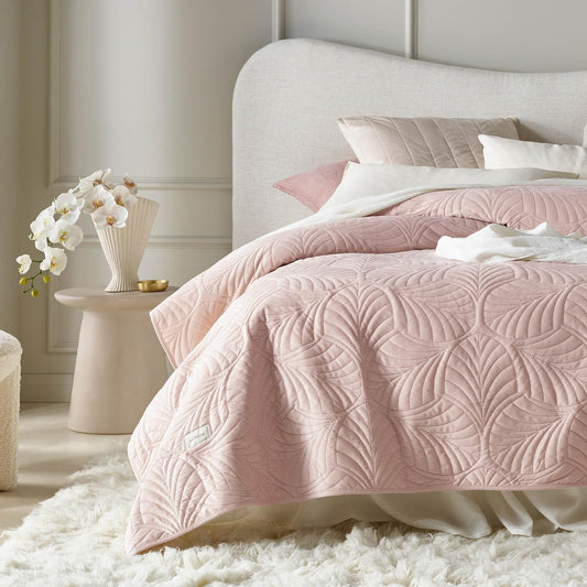 ROOM99 Elegant Powder Pink Throw Blanket 170 x 210 cm, versatile for bed or sofa. Quilted in a stylish velvet design, perfect as a bedspread.