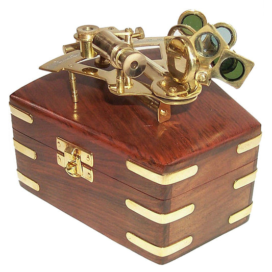 Maritime brass sextant in brass-trimmed wooden box. Nostalgic and decorative.