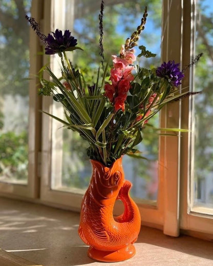 Gluggle Jug XL Orange - 1.2L - Original Gluggle Jug from England - Water jug with glugging sound - Handcrafted and shiny - Iconic jug as vase or decanter.