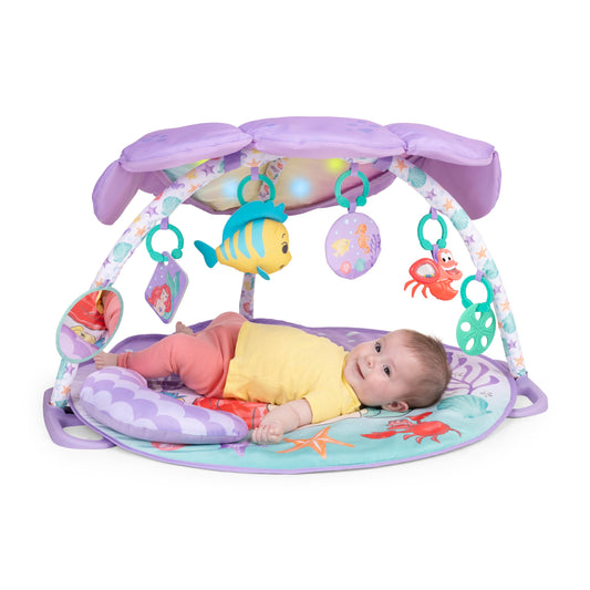 Bright Starts, The Little Mermaid Twinkle Trove illuminated music activity gym, 25 minutes of melodies, 6 toys included, for newborns +.