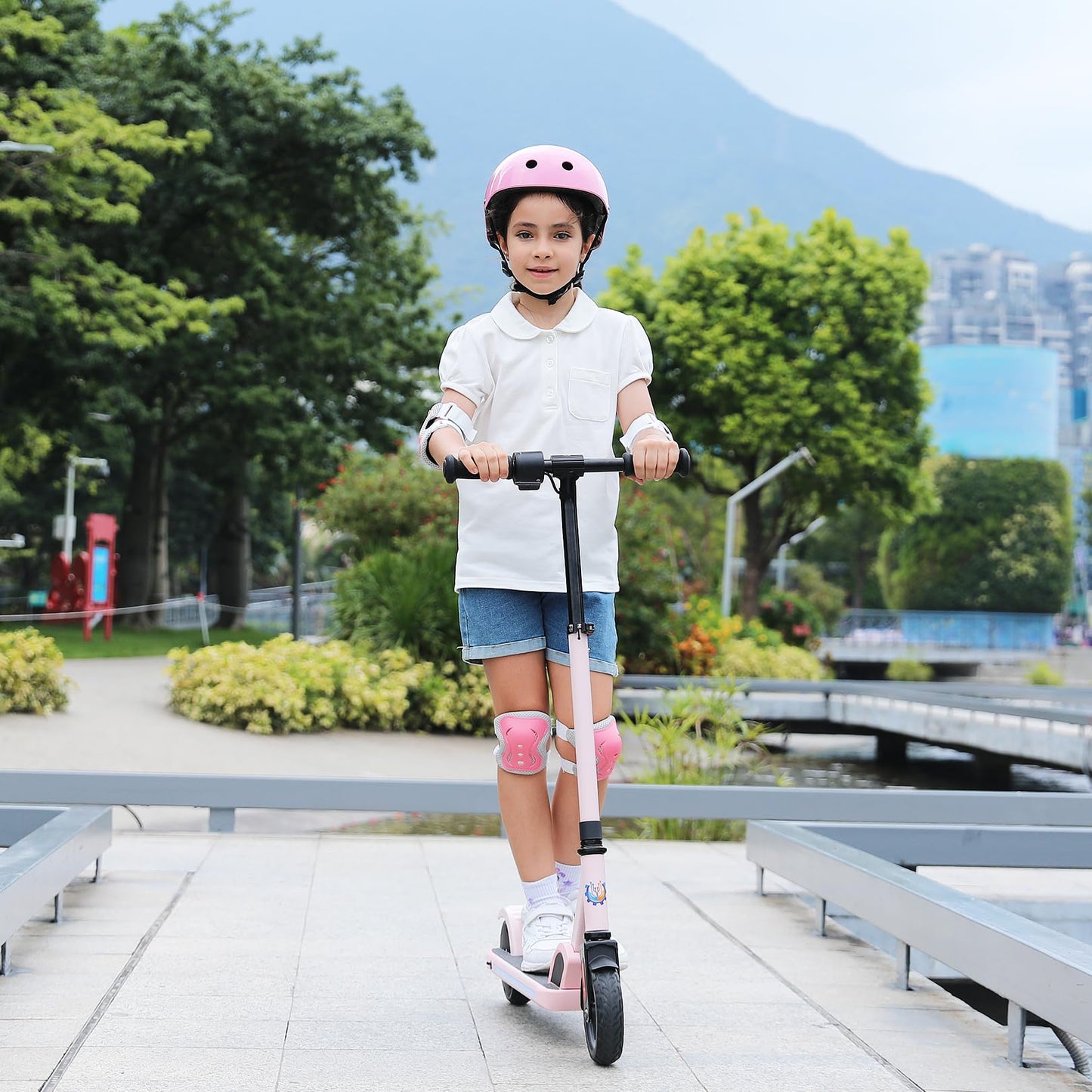 Caroma E-Scooter for kids aged 8-12, 150W motor, 16 km/h, kids' electric scooter, adjustable speed & height, colorful lights, LED display, foldable electric scooter for kids.