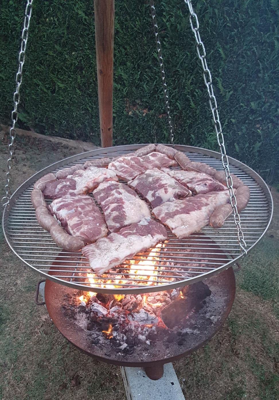 GriHero stainless steel grill grate with a diameter of 70cm for swing grill, grill grid with 3 hanging holes for swing grill grate and fire bowl tripod BBQ grill accessory. Solid 4mm thickness.
