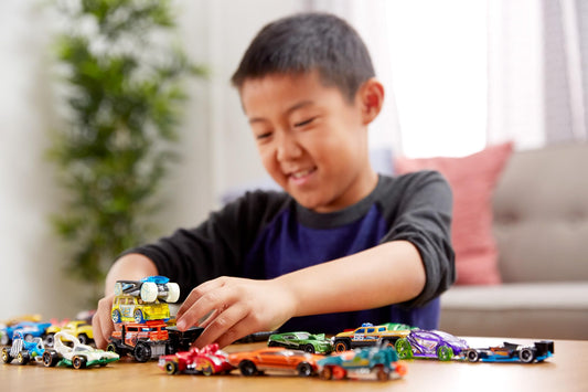 Hot Wheels, set of 8 basic toy cars and trucks in a 1:64 scale, including 1 exclusive vehicle, released throughout the year. Various assortments, style may vary. HPV78.