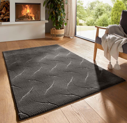 Taracarpet short pile Boho Scandi polyester carpet in 3D look, washable, easy to care for and sturdy. Ideal for living room, bedroom, and children's room, can also be used as a bath mat. Anthracite Dune 200x290 cm.