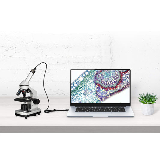 Bresser Junior Microscope Set 40x-1024x with USB camera and bright LED illumination for transmitted light observations, includes comprehensive accessory package and sturdy hard-shell case.