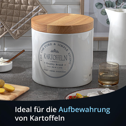 KHG Set of storage containers for potatoes, onions, and garlic, made of ceramic stoneware with white wooden lids, round storage containers labeled for potatoes, onions, and garlic.