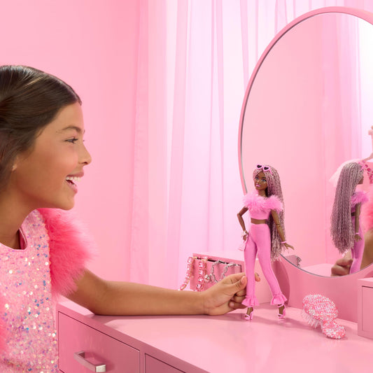 Barbie Deluxe Style Doll No. 4 with Barbiecore outfit, pink and brown braided pigtails, soft pink top with fuzzy collar and matching pants, plus accessories, HYV28.