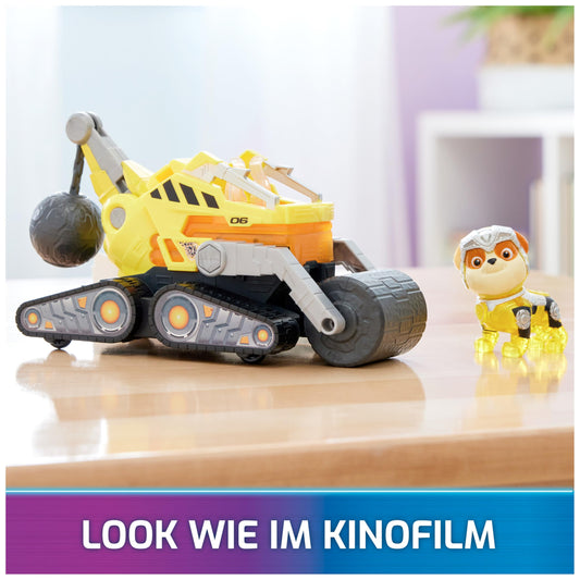 PAW Patrol: The Mighty Movie, superhero base vehicle by Rubble with puppy figure, construction vehicle with light and sound effects, toy suitable for children ages 3 and up.