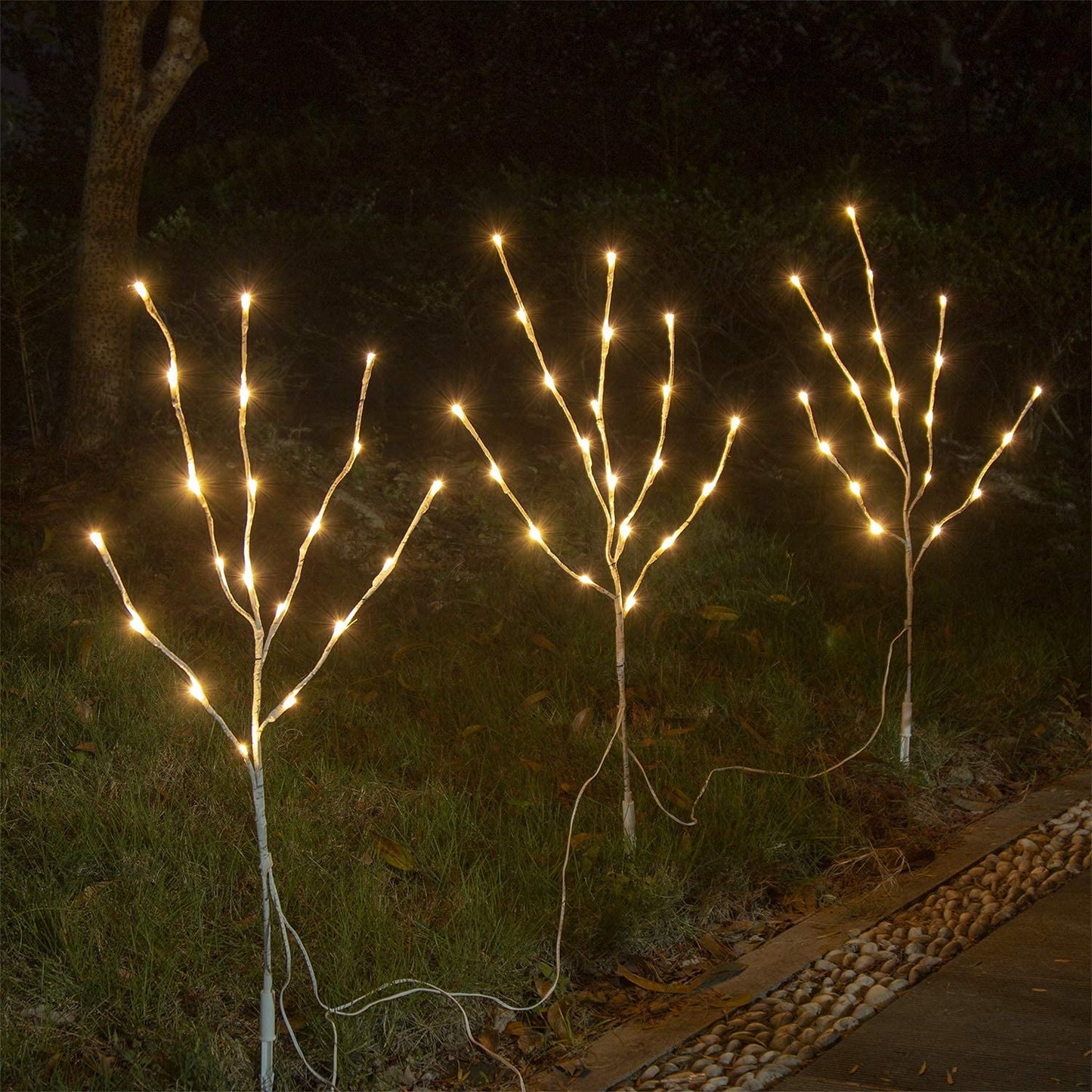 Eambrite decorative branch lights illuminate white birch branch stakes with 60 LED lights for outdoor and indoor decor for Christmas, Easter, Halloween, and parties.