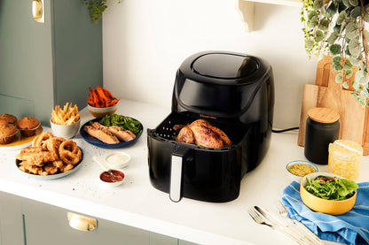 Russell Hobbs XXL 8L Rapid AirFryer with compact design, 7 cooking functions, 10 programs. SatisFry technology is dishwasher safe, reaches up to 220°C, and allows for oil-free frying, grilling, baking, and roasting. Item number: 27170-56.