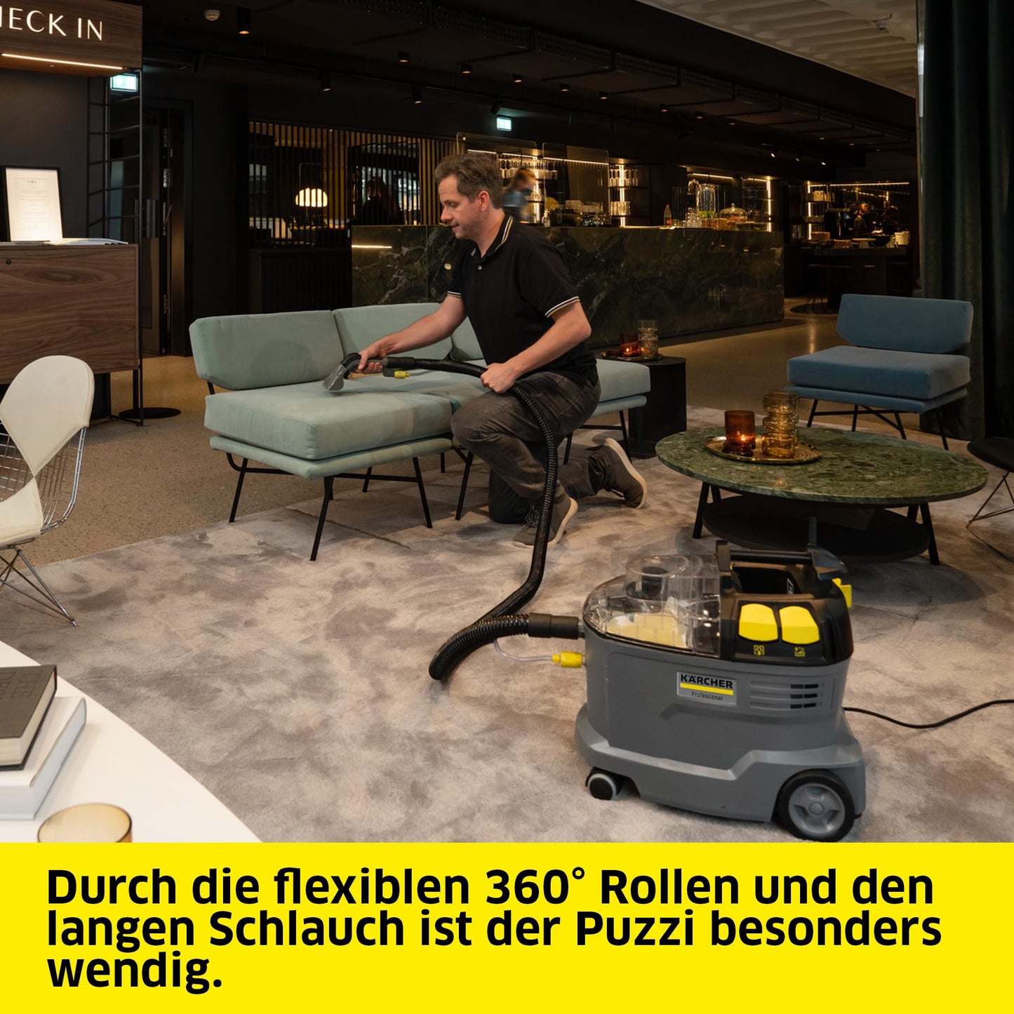 Kärcher carpet cleaner Puzzi 8/1, powerful for upholstery cleaning and spot removal on textiles, includes ergonomic short upholstery nozzle.