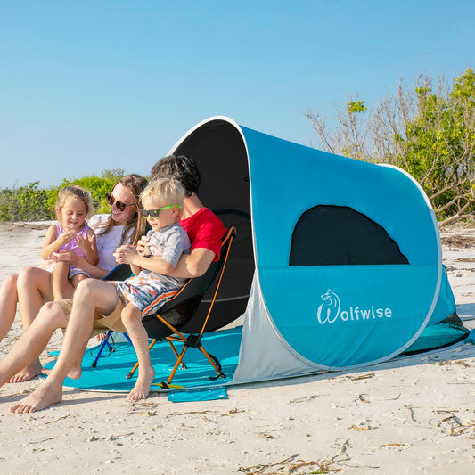 WolfWise beach tent with UV protection 50+, fits 3-4 people, portable pop-up design for sun and wind protection. Great for family camping, garden or beach in dark blue color.