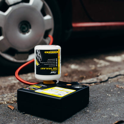 AirMan Resq tire repair kit for cars, featuring Valve-Through technology, repairs all tire types, including the powerful 12V air compressor tire sealant.