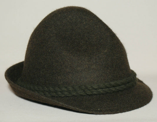 Traditional hat made of loden in green color. Suitable for men and women, perfect for hiking, hunting, or outdoor activities in the mountains or forests. Size: 62.