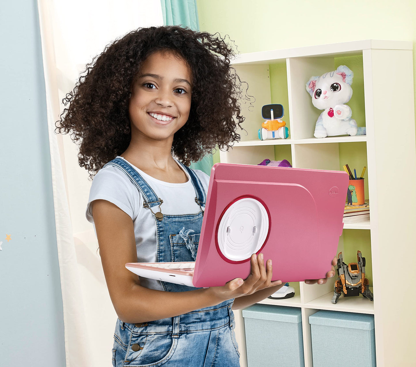 Vtech Genio Learning Laptop in pink - a learning computer with internet access, text program, and educational content on letters, words, math, logic, and more - for children aged 5-12 years.