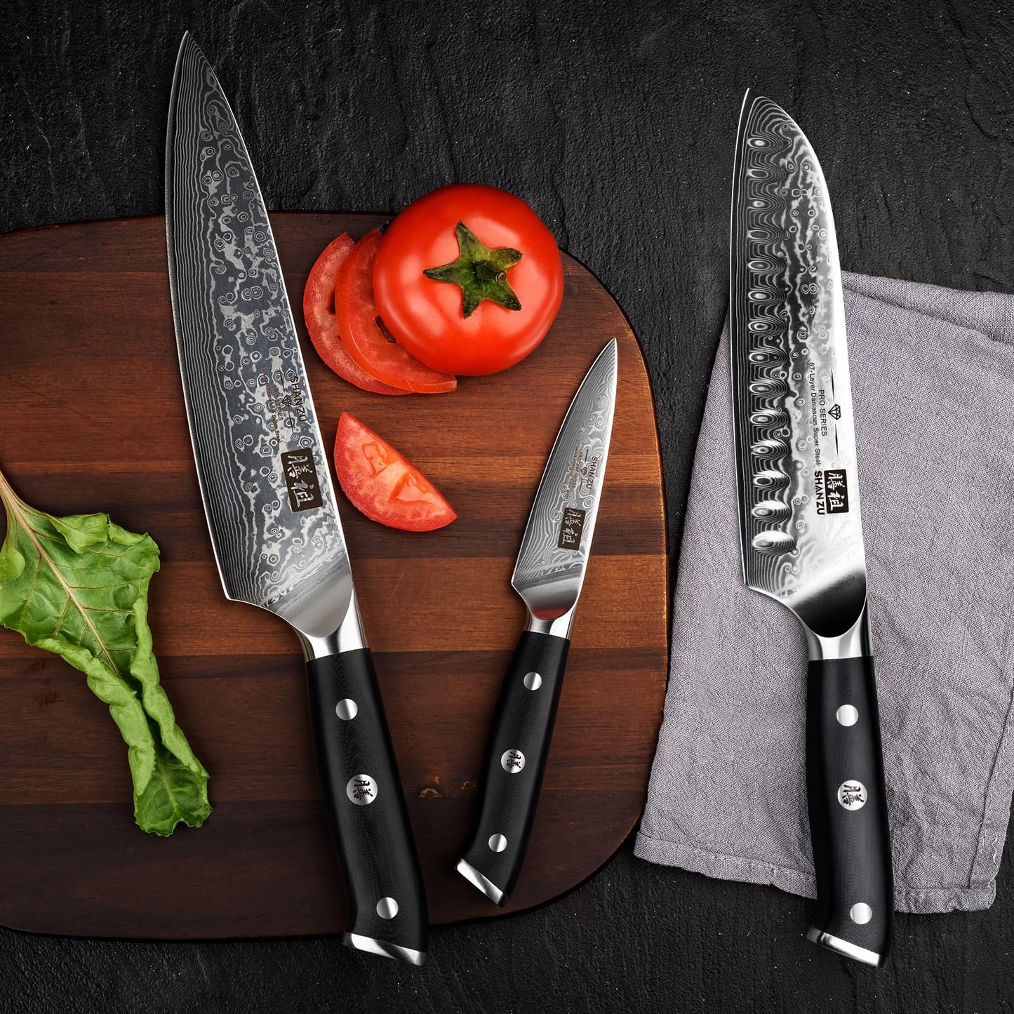 SHAN ZU 3-piece Damascus Knife Set, made of Japanese super steel with high carbon content. It features a G10 handle and comes in a gift box.