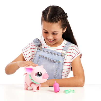 Little Live Pets - My Pet Pig, a cuddly interactive toy pig that walks, dances, and nuzzles. Featuring 20+ sounds and reactions. Batteries included. Ideal for kids ages 4 and up. Pink color.