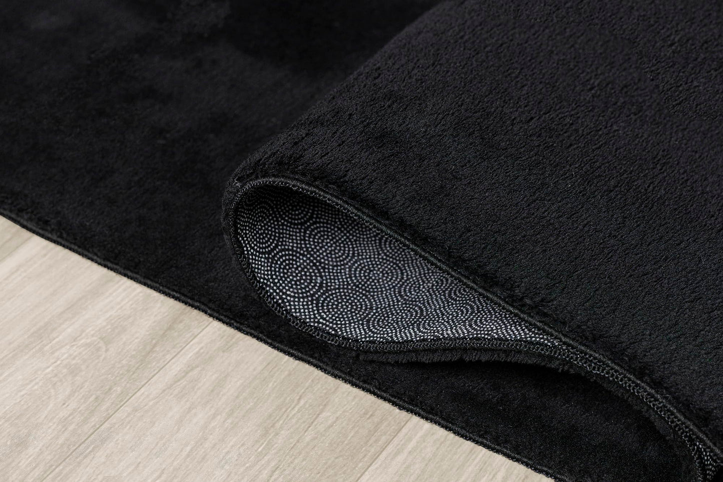 The carpet Relax Modern Fluffy Short Pile Rug, Anti-Slip Bottom, Washable up to 30 degrees, Super Soft, Fur Look, Black, 200 x 290 cm