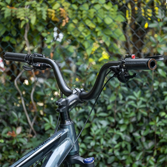 Daring bicycle riser handlebar made of lightweight aluminum alloy, 780mm long, compatible with 31.8 stem, ideal for mountain, road, and hybrid bikes with multiple rise options. (120mm height)