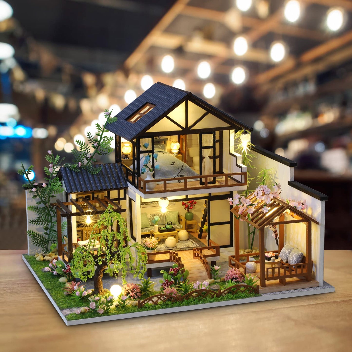 Cute and fun DIY Miniature Dollhouse Kit for building a miniature house with music, furniture, and tools. Build your own creative craft gift idea (Oriental Villa).