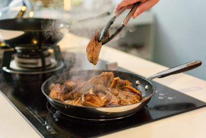Amazon Basics Stainless Steel Non-Stick Frying Pan - Induction Compatible, with Comfortable Handle - 28 cm