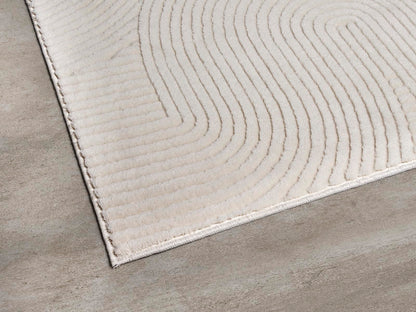 the Rio carpet - modern and soft rug for living room or bedroom with non-slip backing and 3D effect. Fluffy surface, easy to care for and durable. Cream color, 200 x 280 cm.