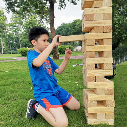 Jac & Mok Giant Tumble Tower game made of pine wood. Includes 60 building blocks and a carrying bag for outdoor fun.