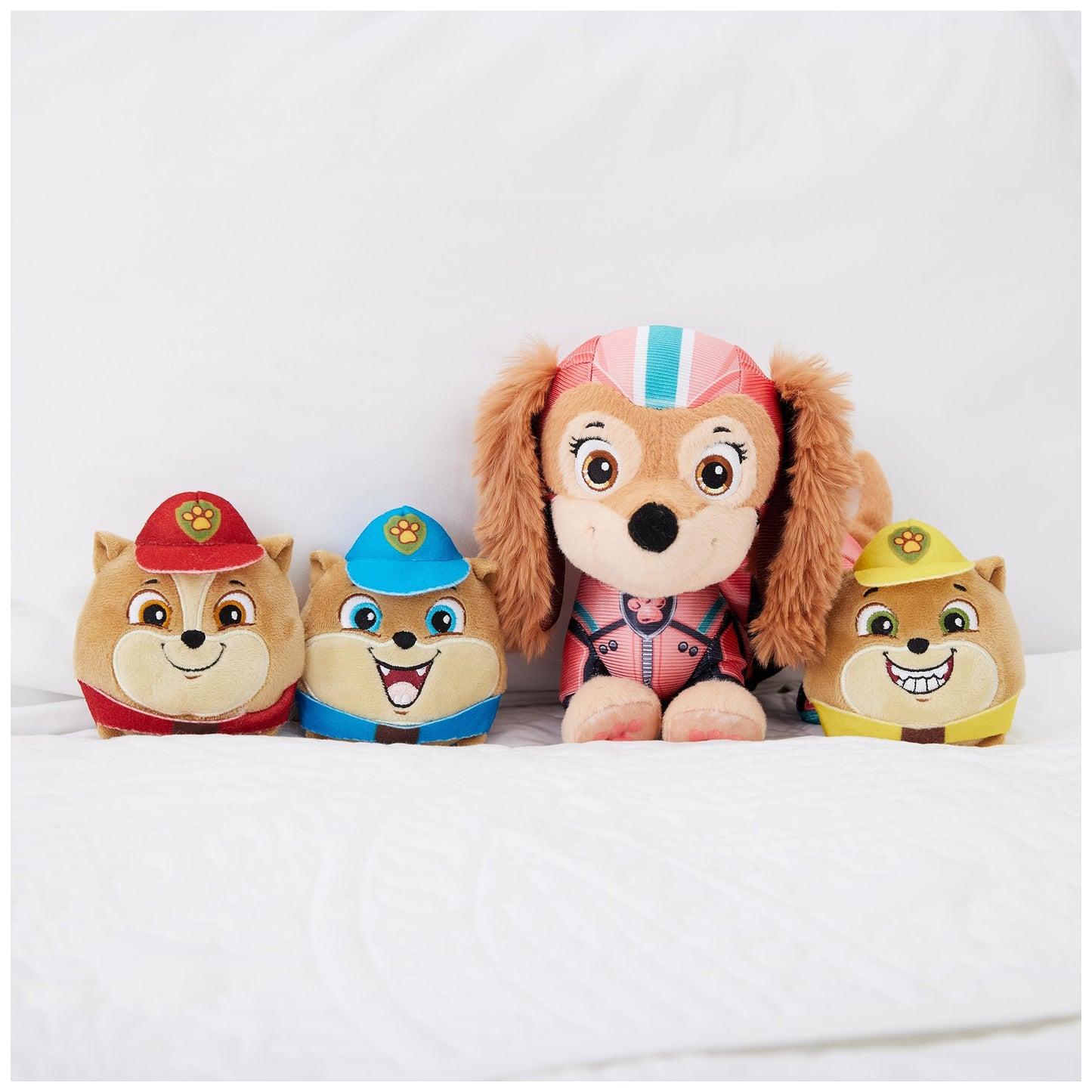 PAW PATROL: The Mighty Movie, Liberty plush figure with stretch function and 3 Junior Patroller mini plush figures, 24cm long, suitable toy for toddlers.