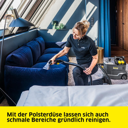 Kärcher carpet cleaner Puzzi 8/1, powerful for upholstery cleaning and spot removal on textiles, includes ergonomic short upholstery nozzle.