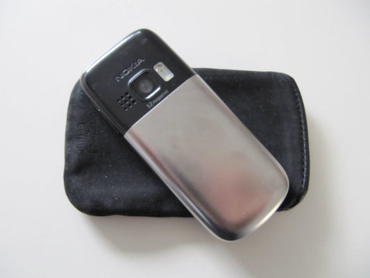 Nokia 6303 Classic Steel (camera with 3.2 MP, MP3, Bluetooth) mobile phone.
