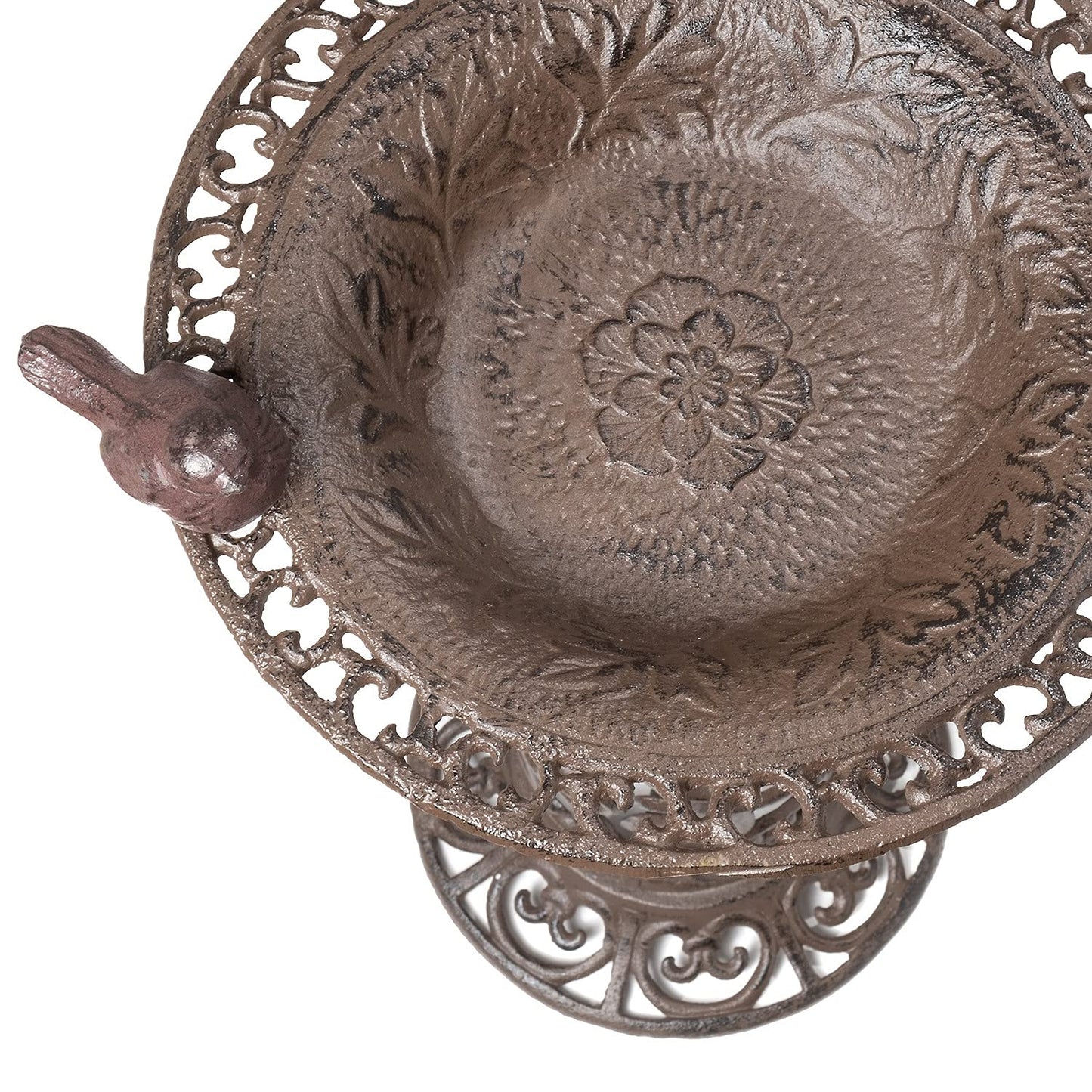 Large bird bath with decorative birds made of cast iron. Metal water bowl for feeding and garden decoration.