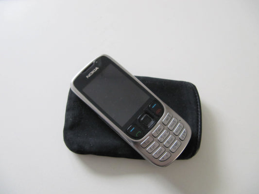 Nokia 6303 Classic Steel (camera with 3.2 MP, MP3, Bluetooth) mobile phone.
