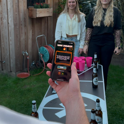 QR-Pong Interactive Beer Pong Set includes 20 hard plastic cups, 4 ping pong balls, in Black/Green/Pink.
