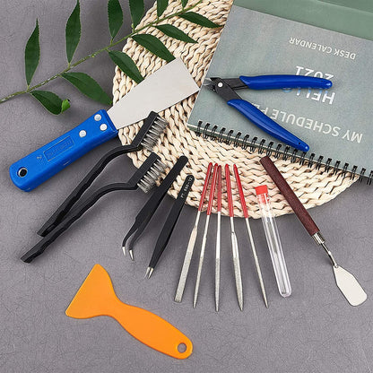 OLYCRAFT 23-piece 3D printer nozzle cleaning and removal tool set includes spatula knives, wire brush, scraper knives, diamond files, and tweezers for 3D printer cleaning.