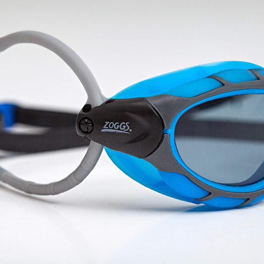 Zoggs Predator Swim Goggles Adult, Men and Women - UV Protection, Anti-Fog, Comfortable Fit & Easy Adjustable Straps Smoke Lens, Blue/Black, Regular
