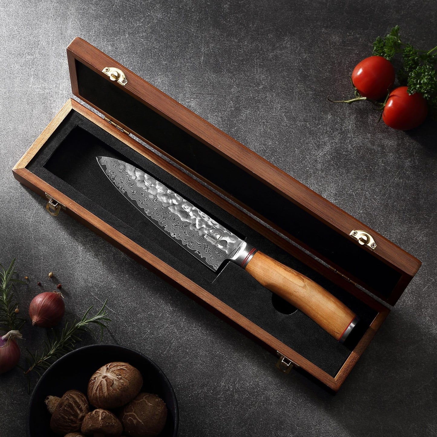 Zayiko Minami Premium Santoku knife with a 17.5 cm blade made of 67 layers of genuine Damascus steel with hammer finish and olive wood handle. Includes wooden box. Ideal for professional chefs and kitchen use.