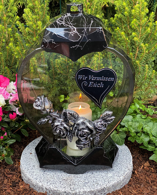 Grave lantern in heart shape with inscription "We miss you". Grave candle in black, 33 cm high. New model including candle, for grave decoration.