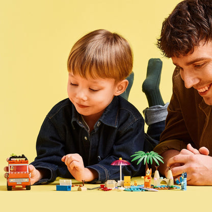 LEGO Bluey: Bluey's Beach & Family Car Trip Toy includes 3 minifigures (Bingo & Chilli), 2 surfboards, a sand castle, and fun accessories. Perfect birthday gift for 4+ year old girls & boys. - 11202