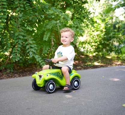Big Bobby Car Classic Dino - Slide car for ages 1 and up in colorful dino design with black safety steering wheel and horn, for children from 12 months (up to 50 kg), green with stickers