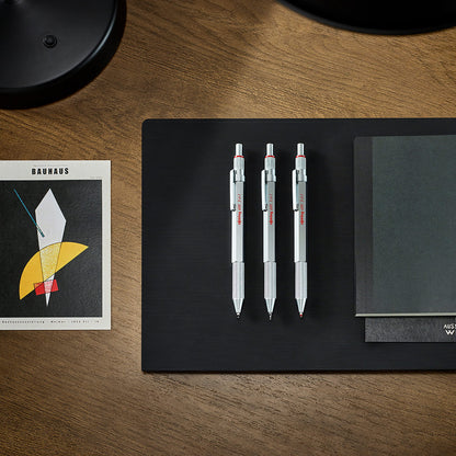 Rotring 600 3-in-1 writing instrument with ballpoint pen and mechanical pencil. Ballpoint pen with 2 fine tips (black and red ink) and 1 mechanical pencil with 0.5mm lead. Silver color.