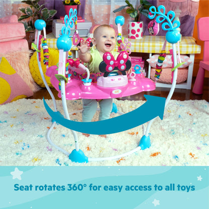 Bright Starts Disney Baby Minnie Mouse Peekaboo Spring and Play Center with light-up and musical play station, 12 activity toys, 360° rotating seat, adjustable height, for children ages 6 months and up.