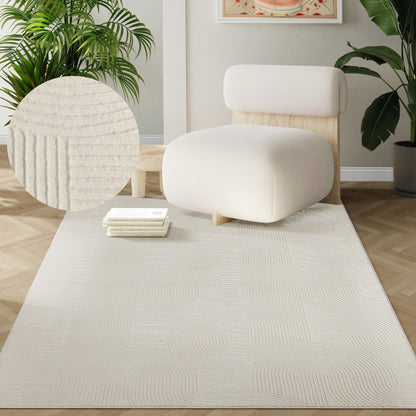 the Rio carpet - modern and soft rug for living room or bedroom with non-slip backing and 3D effect. Fluffy surface, easy to care for and durable. Cream color, 200 x 280 cm.