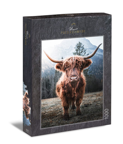 Ulmer Puzzle Forge - Animal Puzzle "Highland" - Classic 1000 piece puzzle - Puzzle motif of a powerful Highland cattle in the cow pasture in front of a frosty Alpine backdrop.