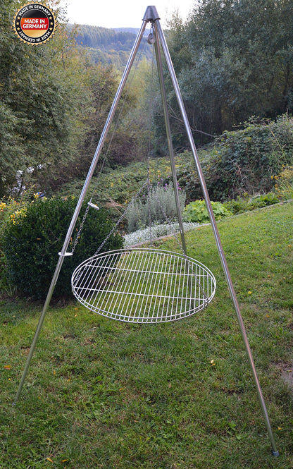 Three-legged swing grill including 60 cm stainless steel grate from German production.