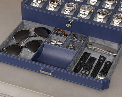 ROTHWELL 12-Slot Leather Watch Box with Valet Drawer is a luxury watch case display organizer. It features a microsuede liner and can hold men's accessories and jewelry in dark blue/grey.